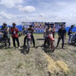 Polsek Bone-Bone Amankan Kegiatan Buka Bumi dan Lomba Ojek Gabah Sukaraya Cup 4