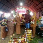 Ringankan Beban Korban Banjir, Kepala Bapenda Luwu Utara Serahkan Bantuan di Posko Tanggap Darurat
