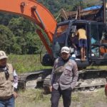 Bhabinkamtibmas Polsek Masamba Monitoring Persiapan Cetak Sawah di Rampi, Dukung Program Ketahanan Pangan