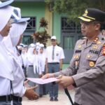 KAPOLRES LUWU UTARA GOES TO SCHOOL, PIMPIN UPACARA HINGGA MINTA GURU RAZIA PONSEL SISWA